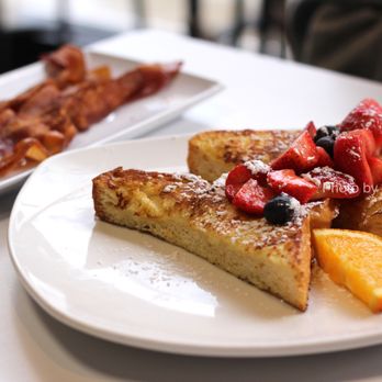 First Bite - Half Stack Fluffy French Toast ($7.25) and Side of Bacon ($4.25) - Breakfast & Brunch Near Me - Ann Arbor, Michigan First Bite - Half Stack Fluffy French Toast ($7.25) and Side of Bacon ($4.25) - Breakfast & Brunch Near Me - Ann Arbor, Michigan