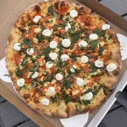 Vodka chicken parm pizza