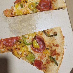 Pizza Hut - If you like your pizza at room temp, chewy bottom and as minimal toppings as allowable by law, this is the place for you.