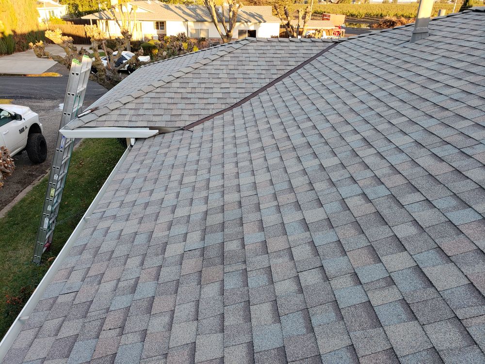 Slide of Trinity Roofing