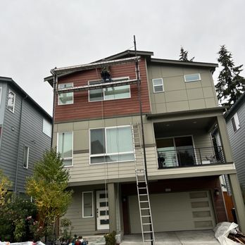 Pacific Exteriors - Finishing up installing the new siding. - Siding Near Me - Seattle, Washington Pacific Exteriors - Finishing up installing the new siding. - Siding Near Me - Seattle, Washington