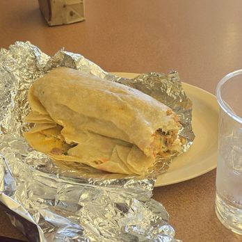Tacos Pauly siiii - Carnitas burrito. With a drink and homemade chips in a bag. - Tacos Near Me - Henderson, Nevada