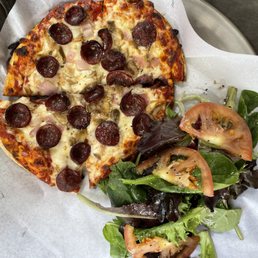 Wild Spicy Elk - Elk sausage, red onion, mozzarella, mushroom and drizzle of truffle oil. Wild Spicy Elk - Elk sausage, red onion, mozzarella, mushroom and drizzle of truffle oil.