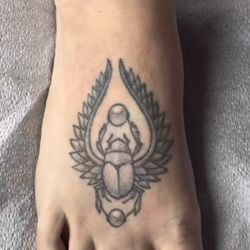 Before, original tattoo by another artist from 2015