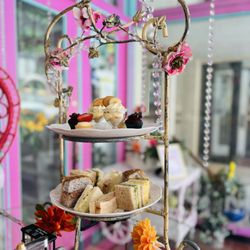 Tea at 1024 - 2 Tier - High Tea Time (pot of tea, salad, assorted sandwiches, petite sweets, scones, jam and cream included)