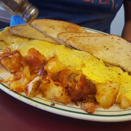 Omelette, toast, and smashed home fries