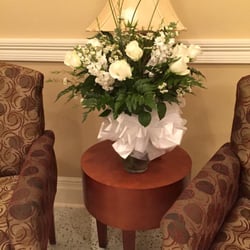 Betty's Flowers & Blissful Blooms - Dozen of Roses for a Retirement party.