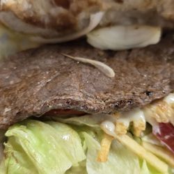 Miyi La Cubanita Cuban Cafe - Super thin slice of steak.