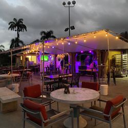 Olomana Golf Links - Lovely covered seating area w comfortable chairs.