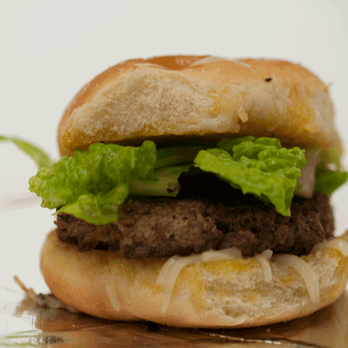 Entree Moores - a hamburger with lettuce and cheese - American Near Me - River Rouge, Michigan Entree Moores - a hamburger with lettuce and cheese - American Near Me - River Rouge, Michigan