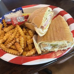 Cuban sandwich with fries.