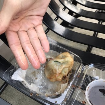 Crying Thaiger - Super greasy chive dumpling (more like a bao--not a gyoza type of dumpling) - Thai Near Me - Malden, Massachusetts Crying Thaiger - Super greasy chive dumpling (more like a bao--not a gyoza type of dumpling) - Thai Near Me - Malden, Massachusetts