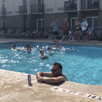 Four Points by Sheraton Myrtle Beach - Outdoor pool that extends indoor as well - Hotels Near Me - Myrtle Beach, South Carolina