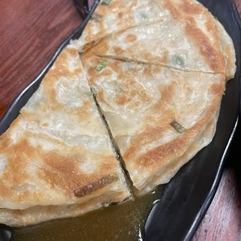 Noodle House - Green Onion Pancake with a fantastic curry dipping sauce - Noodles Near Me - Midland, Texas Noodle House - Green Onion Pancake with a fantastic curry dipping sauce - Noodles Near Me - Midland, Texas