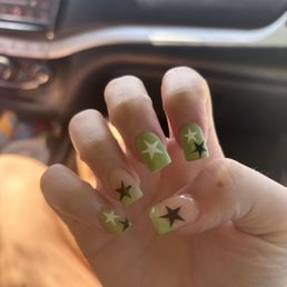 MY nails after having her paint over what I want and her completely changing my design