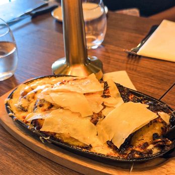 Emiliano’s Steakhouse - Gratin & Glory: Sweet plantains with white cheese cream and parmigiano-reggiano - Steakhouses Near Me - Antioch, Tennessee Emiliano’s Steakhouse - Gratin & Glory: Sweet plantains with white cheese cream and parmigiano-reggiano - Steakhouses Near Me - Antioch, Tennessee