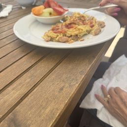 Chicken apple sausage, eggs and fruit. Chicken apple sausage, eggs and fruit.