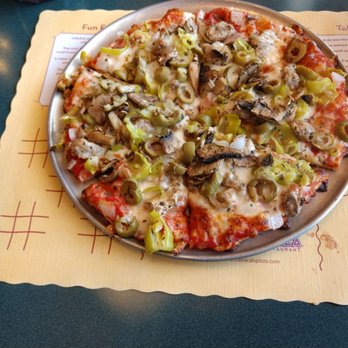 Monical's Pizza - a pizza with mushrooms and celery - Pizza Near Me - Morton, Illinois Monical's Pizza - a pizza with mushrooms and celery - Pizza Near Me - Morton, Illinois