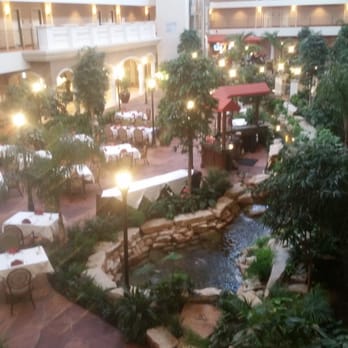 Woolley's Classic Suites - Balcony view of lounge - Hotels Near Me - Aurora, Colorado Woolley's Classic Suites - Balcony view of lounge - Hotels Near Me - Aurora, Colorado