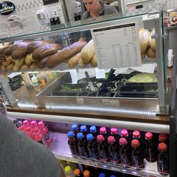No mask employees prepping food No mask employees prepping food