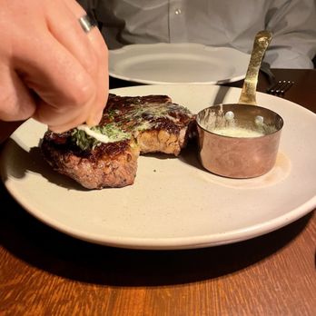 Dēliz - Brushing the steak with garlic butter - Italian Near Me - Chicago, Illinois Dēliz - Brushing the steak with garlic butter - Italian Near Me - Chicago, Illinois