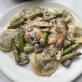 Burtons Grill & Bar - Chicken & Wild Mushroom Ravioli. My favorite dish I've tried here. - New American Near Me - Huntersville, North Carolina Burtons Grill & Bar - Chicken & Wild Mushroom Ravioli. My favorite dish I've tried here. - New American Near Me - Huntersville, North Carolina