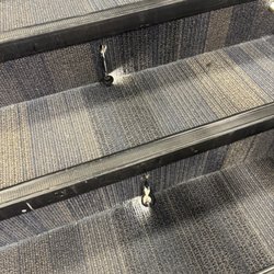 ZavaZone - Stair lighting pulled out of the stairs where kids are walking, leaving exposed wiring.