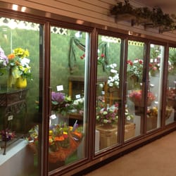 Jacobsen's Flowers & Gifts - Fresh flower arrangements and flowers by the bunch in the cooler.