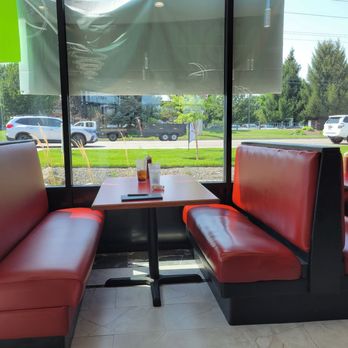 DK Vietnamese - Most seating is booth style with a few tables and chairs added at side and in a space near the front. - Vietnamese Near Me - Meridian, Idaho