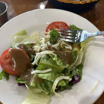 Bella Sera Of Leander - Bottled dressing on a salad - Italian Near Me - Leander, Texas Bella Sera Of Leander - Bottled dressing on a salad - Italian Near Me - Leander, Texas