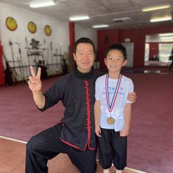 California Kung Fu & Tai Chi Institute - Belt test. Picture with sifu.