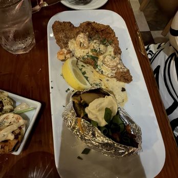 Snug Harbor Jazz Bistro - Fish Marigny with Fully Loaded Baked Potato - Jazz & Blues Near Me - New Orleans, Louisiana Snug Harbor Jazz Bistro - Fish Marigny with Fully Loaded Baked Potato - Jazz & Blues Near Me - New Orleans, Louisiana