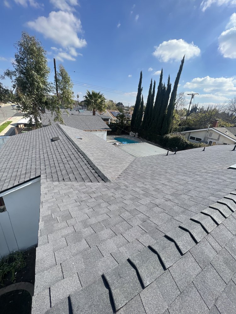 Slide of Ortiz Roofing