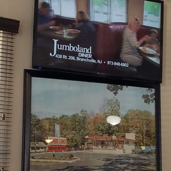 Jumboland - a woman sitting in front of a tv - Diners Near Me - Branchville, New Jersey