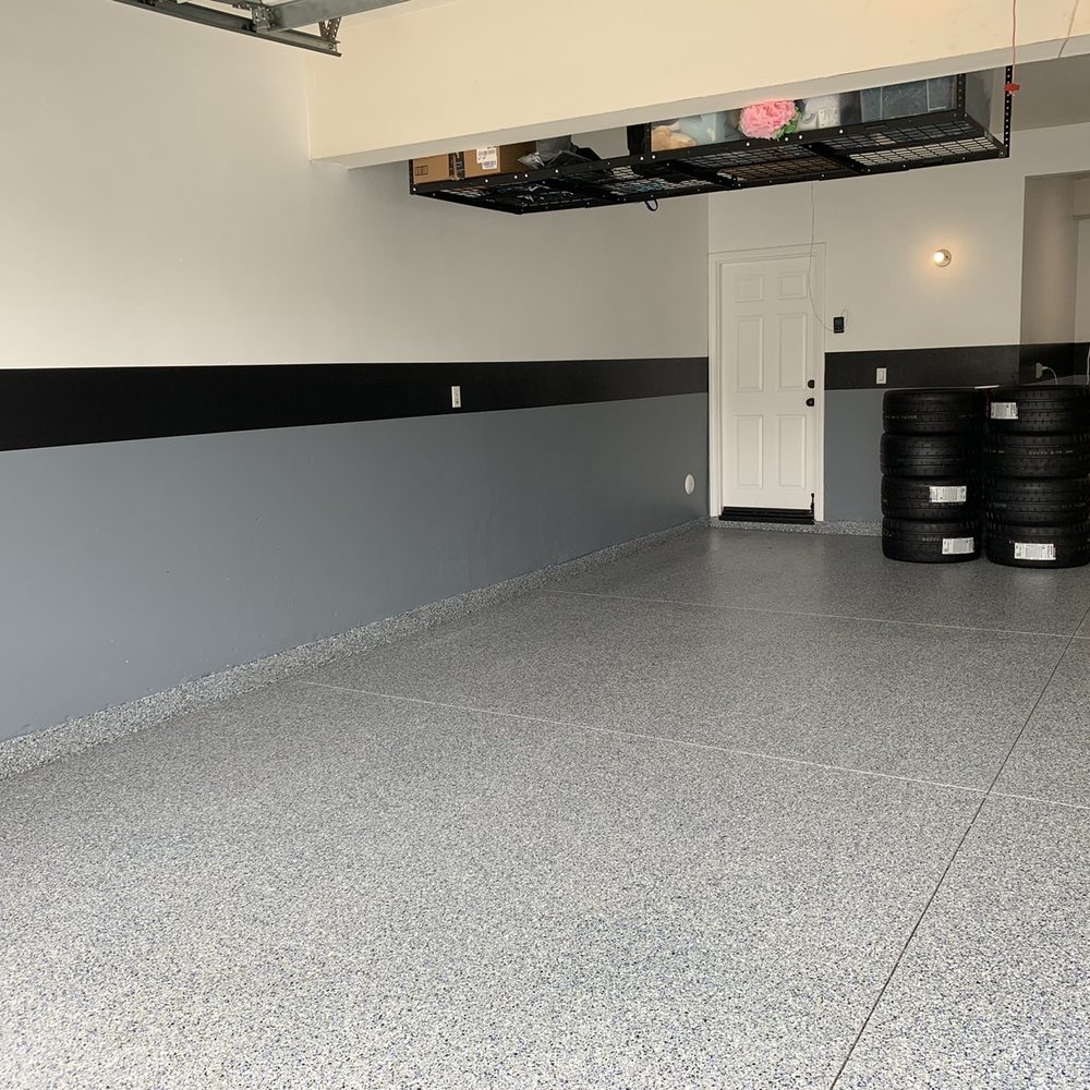 United Epoxy Floors - a garage with black and white walls - Flooring Near Me United Epoxy Floors - a garage with black and white walls - Flooring Near Me