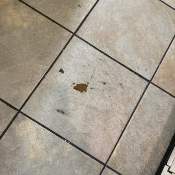 Buffalo Wild Wings - Literal poop on the floor that's been sitting since we checked in with no one caring to do anything about it. - American Near Me - Buena Park, California