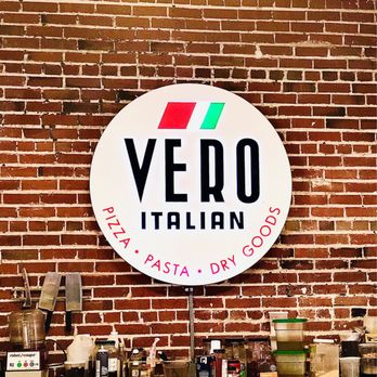 Vero Italian - a sign on a brick wall - Pizza Near Me - Denver, Colorado Vero Italian - a sign on a brick wall - Pizza Near Me - Denver, Colorado