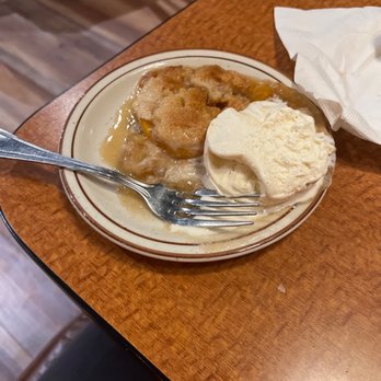Strayhorn Grill - Peach cobbler with a scoop of vanilla ice cream - American Near Me - Fruita, Colorado