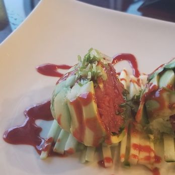 Sushi Express - Avocano roll. Fresh, spicy tuna cilantro and green onion stuffed inside a shell of thinly sliced avocado then drizzled with a spicy sauce - Korean Near Me - San Antonio, Texas Sushi Express - Avocano roll. Fresh, spicy tuna cilantro and green onion stuffed inside a shell of thinly sliced avocado then drizzled with a spicy sauce - Korean Near Me - San Antonio, Texas