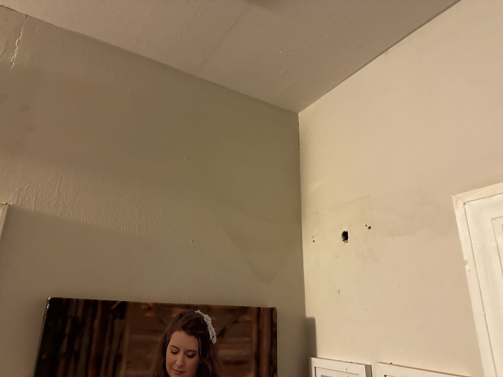 Slide of Gulliver Roofing