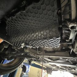 Gearheads - Draining oil pan for replacement.