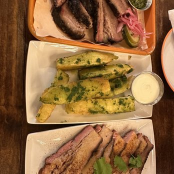 Smoke and Dough - Top to bottom: Brisket (great), yuca fritas (okay), pork belly (decent) - Barbeque Near Me - Miami, Florida Smoke and Dough - Top to bottom: Brisket (great), yuca fritas (okay), pork belly (decent) - Barbeque Near Me - Miami, Florida