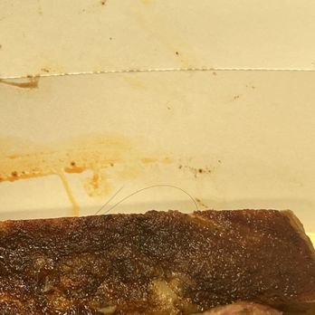 Kinder's Meats Deli BBQ - Was enjoying my ribs and saw this piece of hair peaking out at me from the corner, it was WRAPPED around this rib - Delis Near Me - Martinez, California