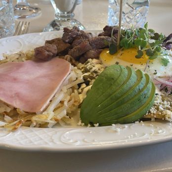 Crepas Culichi - Chilaquiles served with the most unappetizing steak, hash browns, ham, and avocado which cost around $27 - Creperies Near Me - Oak Park, Illinois Crepas Culichi - Chilaquiles served with the most unappetizing steak, hash browns, ham, and avocado which cost around $27 - Creperies Near Me - Oak Park, Illinois