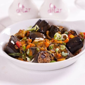 Shapur Indian Restaurant - Fresh baby aubergines cooked with onions and garlic in fresh mixed herbs -- at +Sitar Indian Restaurant - Indian Near Me - London, XGL Shapur Indian Restaurant - Fresh baby aubergines cooked with onions and garlic in fresh mixed herbs -- at +Sitar Indian Restaurant - Indian Near Me - London, XGL