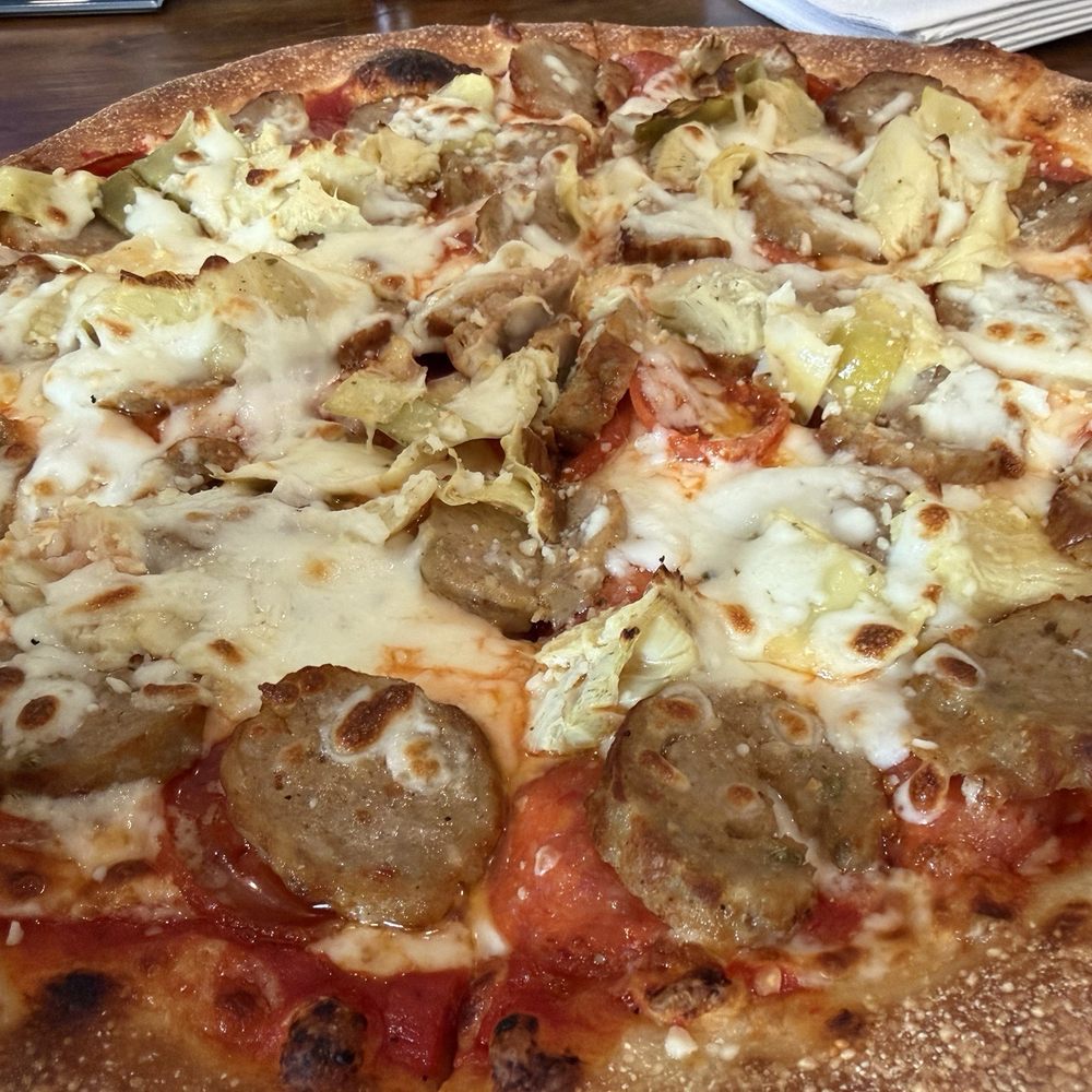 Pepperoni, sausage, & artichoke pizza, sooooo delicious. Service was great and very friendly. Pepperoni, sausage, & artichoke pizza, sooooo delicious. Service was great and very friendly.