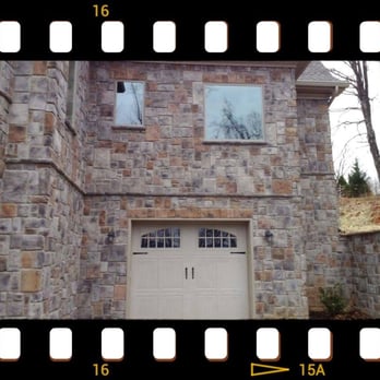 Patriot Stoneworks & Rockscaping - a garage door and window - Landscaping Near Me Patriot Stoneworks & Rockscaping - a garage door and window - Landscaping Near Me
