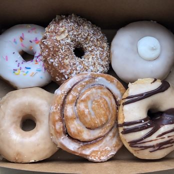 Fry Baby Donuts - Top left to bottom right: Sprinkle, coconut caramel almond, vanilla bourbon, maple, cinnamon roll, chai - Donuts Near Me - Buffalo, New York