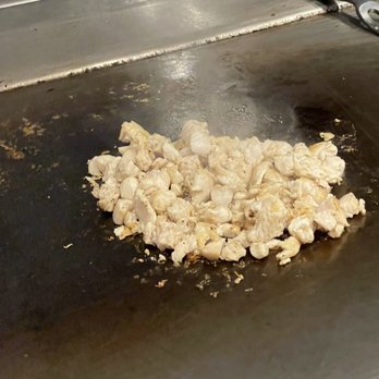 Benihana - Chicken being prepared for the fried rice. - Sushi Bars Near Me - Golden Valley, Minnesota