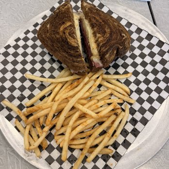 Outta Bronx - Corned Beef Reuben with fries - Chicken Wings Near Me - Chandler, Arizona Outta Bronx - Corned Beef Reuben with fries - Chicken Wings Near Me - Chandler, Arizona